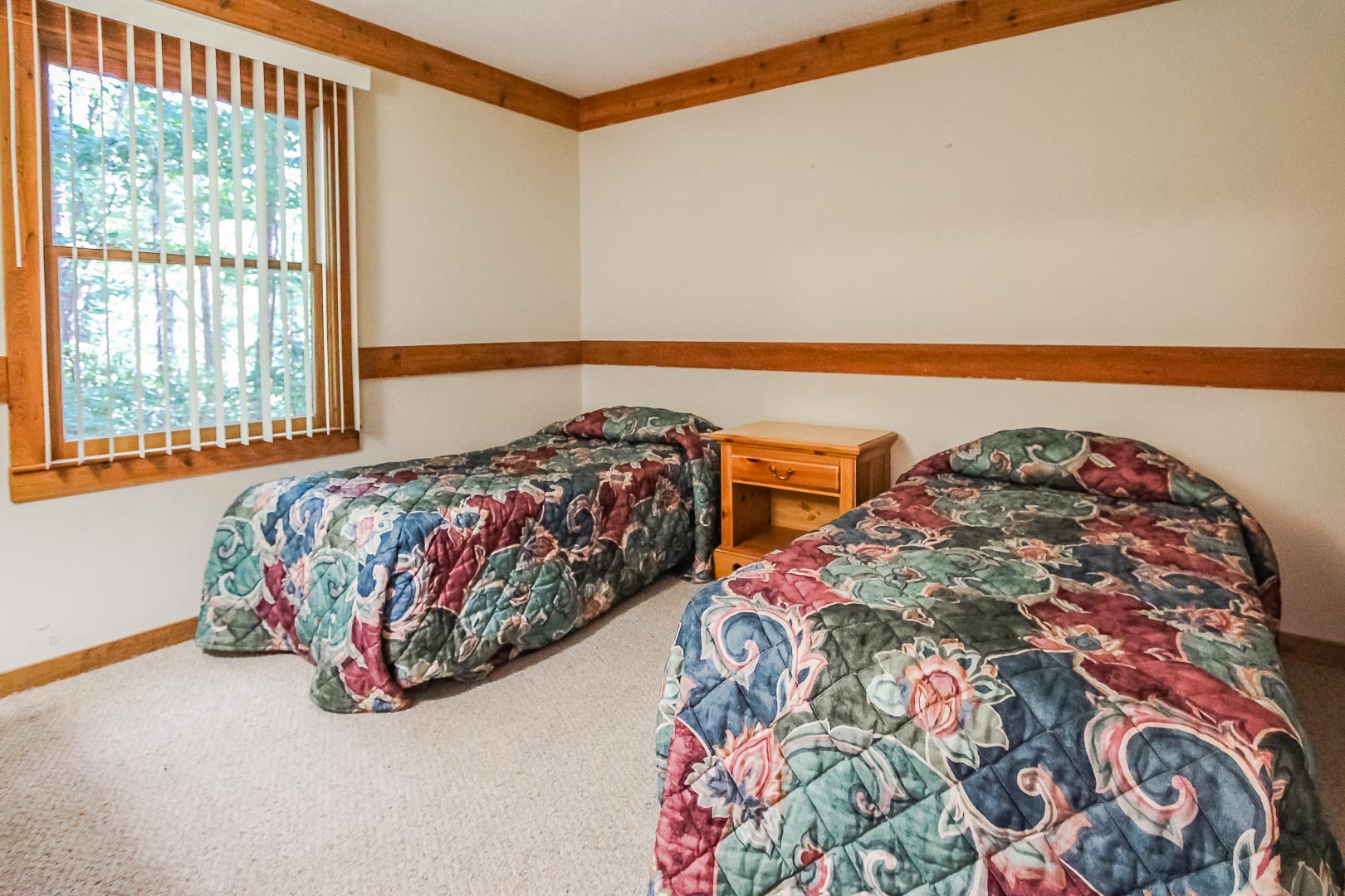 A two bedroom with double beds at VRI's Alpine Crest Resort in Georgia.